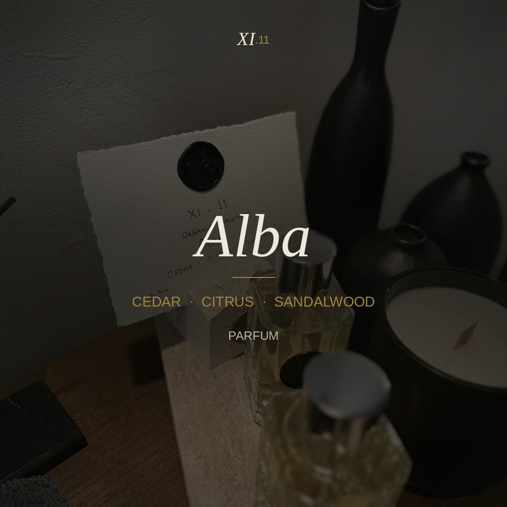XI.11 Alba Parfum — square amber glass bottle with silver cap, 100ml